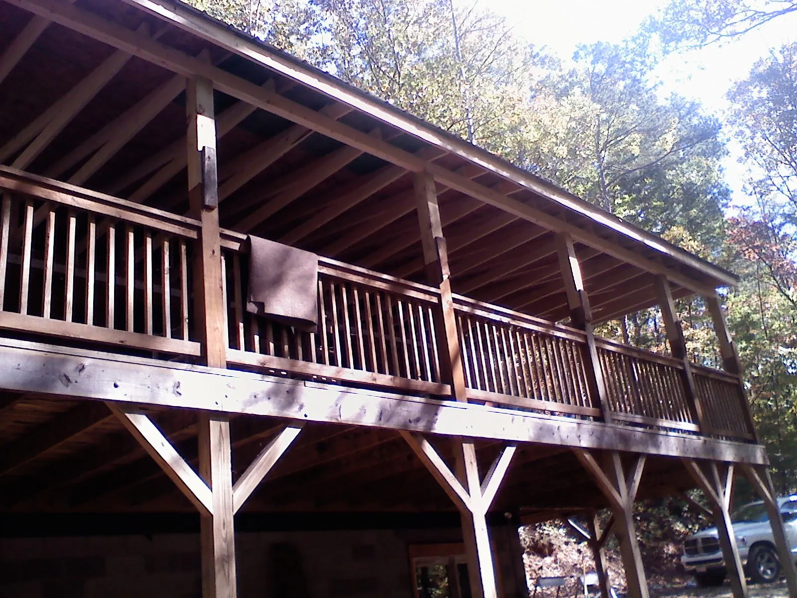 Timber framing under a new elevated porch and deck — Roof Leak Repair in Humboldt by Roofing Brothers